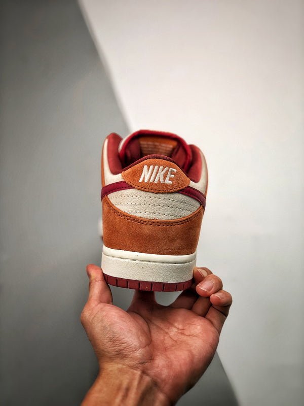 NIKE Dunk Low "Russet Cedar" - Houdini
